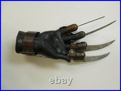 A Nightmare on Elm Street Freddy Krueger metal glove prop replica by NECA